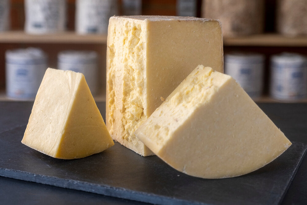Display of Kirkham's Lancashire, an unpasteurised hard & crumbly cheese from Lancashire, made with cow's milk.